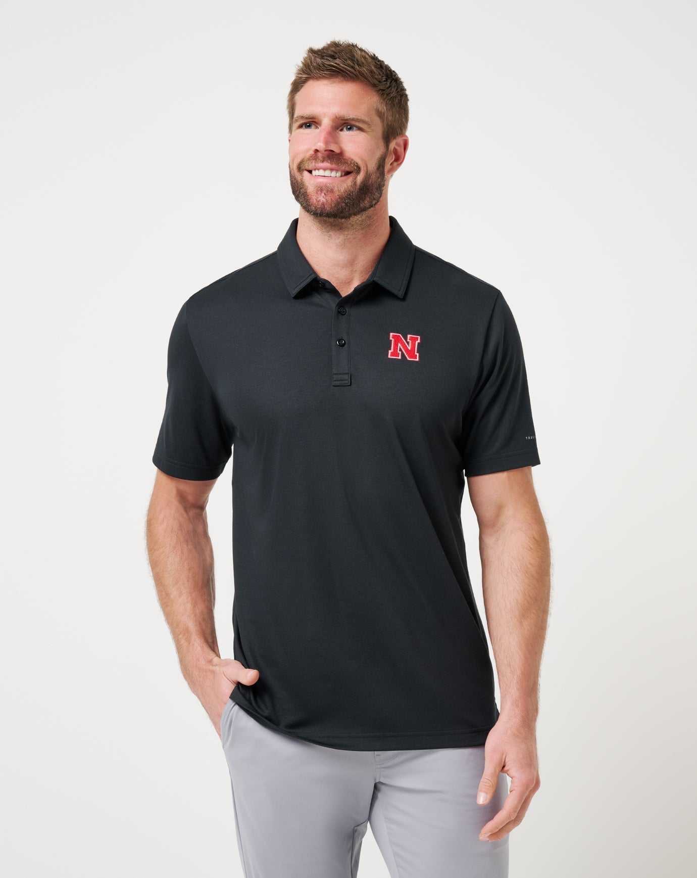 Travis Mathew Nebraska School Pride Polo