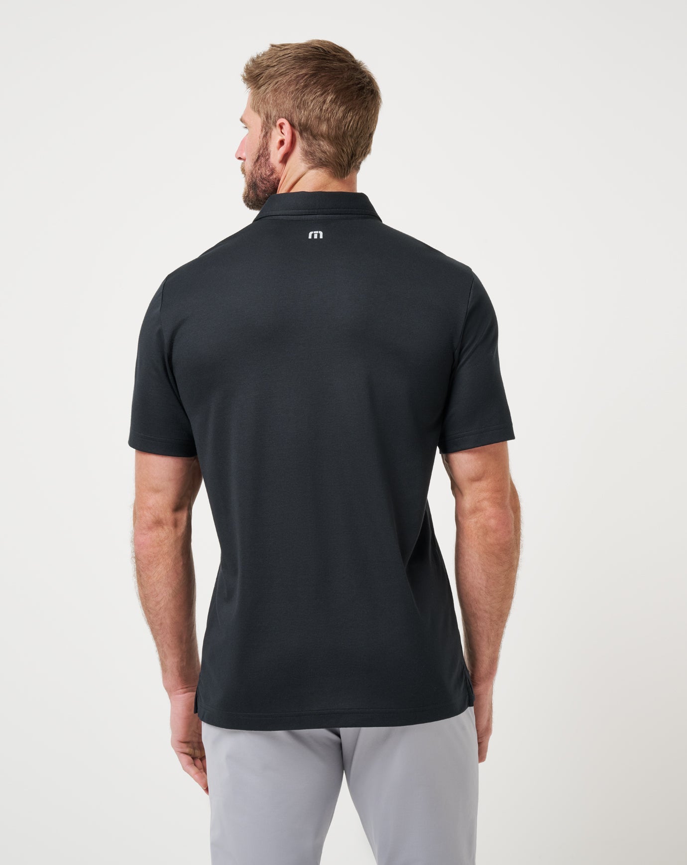 Travis Mathew Nebraska School Pride Polo