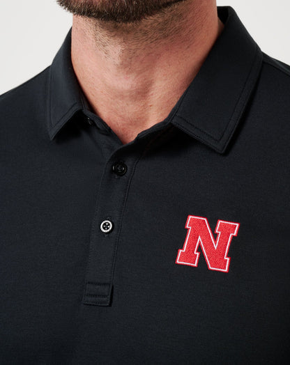 Travis Mathew Nebraska School Pride Polo